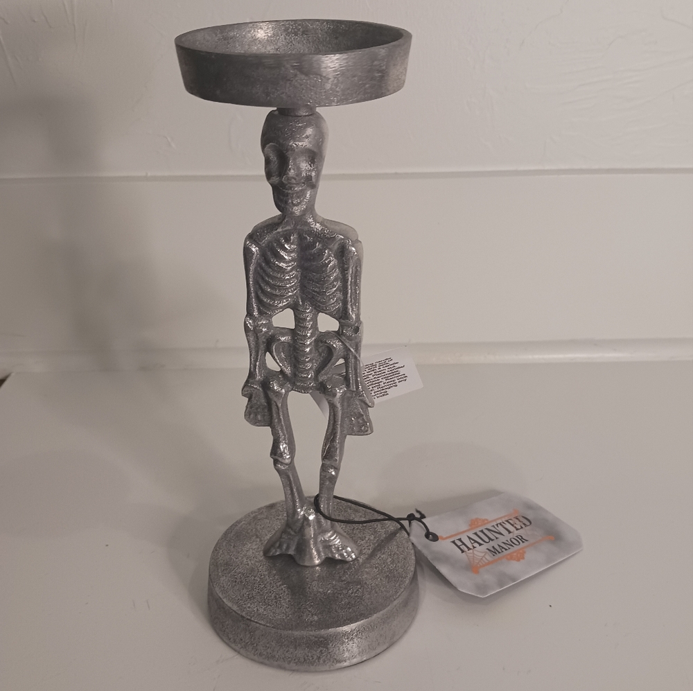 Skeleton candle holder